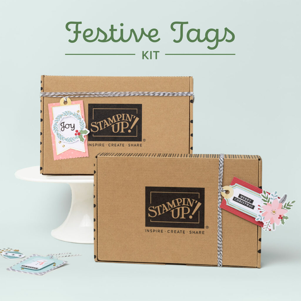 2 Festive Tags Kit boxes with string and tags on them, ready to gift.