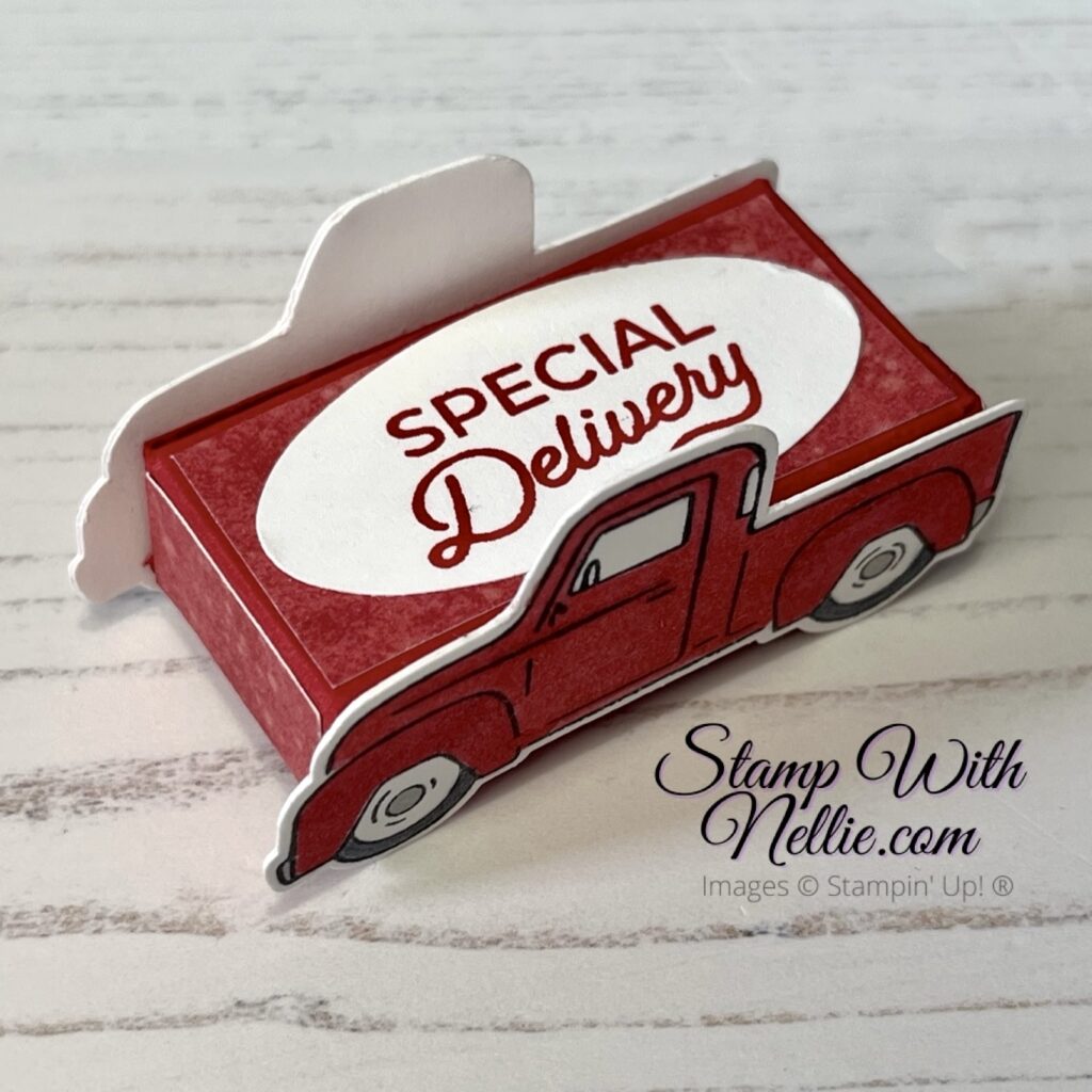 Photo of the top view of a little red truck treat box with the words Special Delivery on an oval label